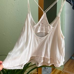 Criss-cross cropped white tank top